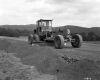 Worker Grading Gravel