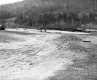 Sanborn Property, Dirt-Covered Field along Railroad Tracks