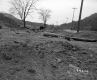 Sanborn Property, Dirt-Covered Field along Railroad Tracks