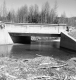 Concrete Bridge with Branches in Foreground