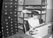 Woman Typing in Highway Dept. Computer Room
