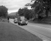 Two Trucks Paint Lines on Highway 2