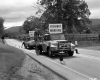 Two Men with Trucks Painting Lines on Highway 2