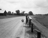 Two Men at Guardrail Installation