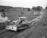 Tractor and Automobiles with Burning Brush
