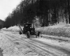 Snow Removal Along Wooded Stretch of Highway