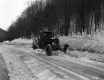 Snow Removal Along Wooded Stretch of Highway