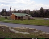 Building with Shrubs and Automobiles