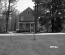 Dwelling and Road with Trees