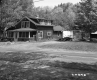 Dwelling with Driveway Next to Paved Road