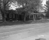 Two Buildings Next to Paved Road