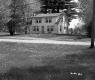 House with Trees Next to Road