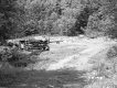 Two Trucks and Dirt Road