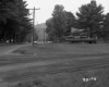 Building with Paved Road and Dirt Road
