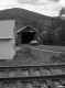 Cox Brook Bridge with Building and Railroad Tracks