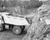 I89 Construction Site with Three Men, Construction Truck, and Outcrop