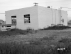 Back View of Building with Soil and Grass