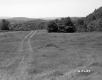 Field with View of Distant Landscape