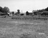 Dwelling with Fence and Dilapidated Structure