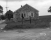 Stone Building Next to Two Roads