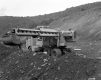 Construction Site with Machinery and Sloped Landscape