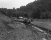 Construction Site with Vehicles and Building