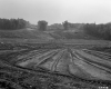 Construction Site with Hill and Trucks