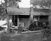 Back of Building with Trees and Automobile Tires