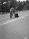 I 89 Two Men Sealing Cracks Top Center