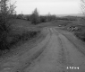 Car on Rural Dirt Road