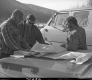 Highway Workers Reviewing Plans