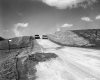 Cars on Dirt Road