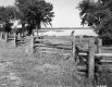 Sand Bar Recreation Area Wood Fence Across Foreground Lake Centered