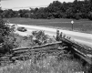 Split Rail Fence in Foreground with Car