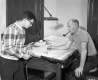 Engineers around a drafting table