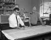 Two engineers at table