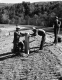 Workmen Erecting Marker along Route 12