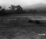 Excavated Field after a Storm with Bennington Memorial in Background