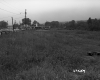 Distant View of Gas Station and Dairy Queen Parking Lot