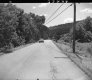 Car on Paved Road