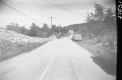 Cars by Paved Road