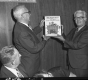 Beach Bly Retirement Party- Arnold presenting gift to Beach