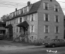 Front of Apartment with Paved Road