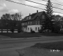 Three Story Apartment Dwelling with City Street
