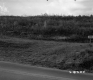 Rural Paved Road in Berlin with No Trespassing Sign