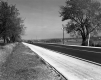 Completed Highway Construction in Charlotte with Large Farm