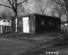 Small Shack in Bennington with Trailer in the Background