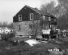 Side view of Home with Junk Yard in Bennington
