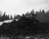 Construction Vehicle moving Earth Material
