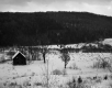 Abandoned Dwelling with Hilly Landscape